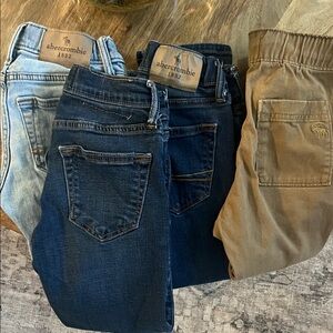 Abercrombie Kids Jeans in Light Blue, Dark Blue, and Tan
